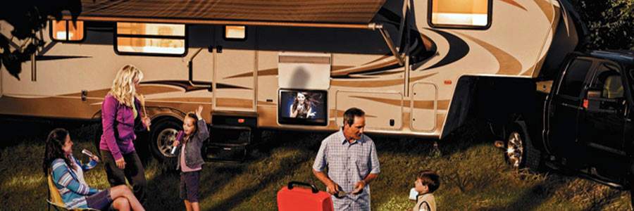 A Fifth-Wheel Travel Trailer with Onan Diesel RV Generator on a Family Trip.