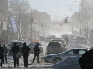 New York City streets clogged with cars and drivers after a snowstorm.