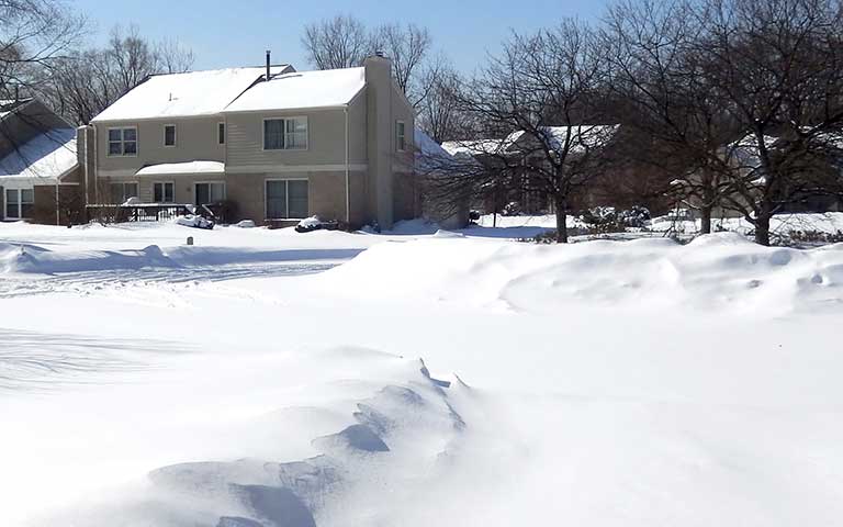 Winter in a Snow-Covered Suburban Neighborhood After a Storm