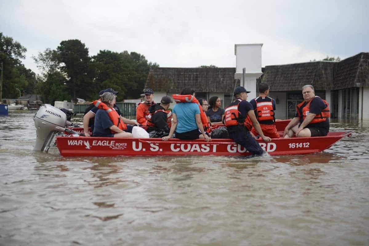 Harvey Victims evacuate in a United States Coast Guard Rescue Boat.