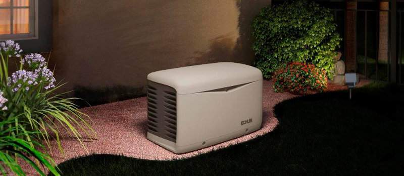 Kohler Standby Generator Installed on a gravel base more than 18 inches from the home.
