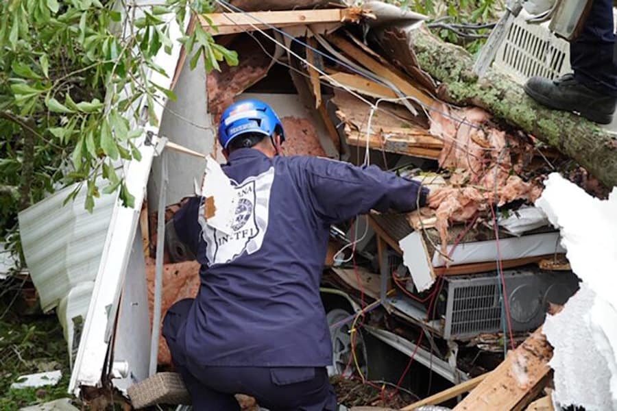 A task force from Indiana Searches a Home left in rubble for Survivors after Hurricane Laura - FEMA Photo