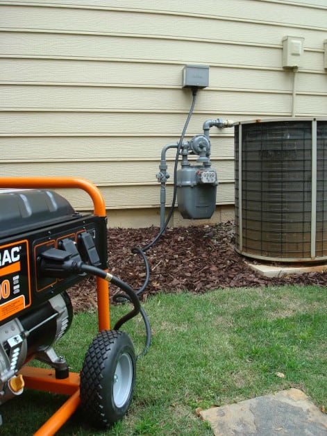 A Generac Generator Connected to a house via the Manual Transfer Switch Inlet Box