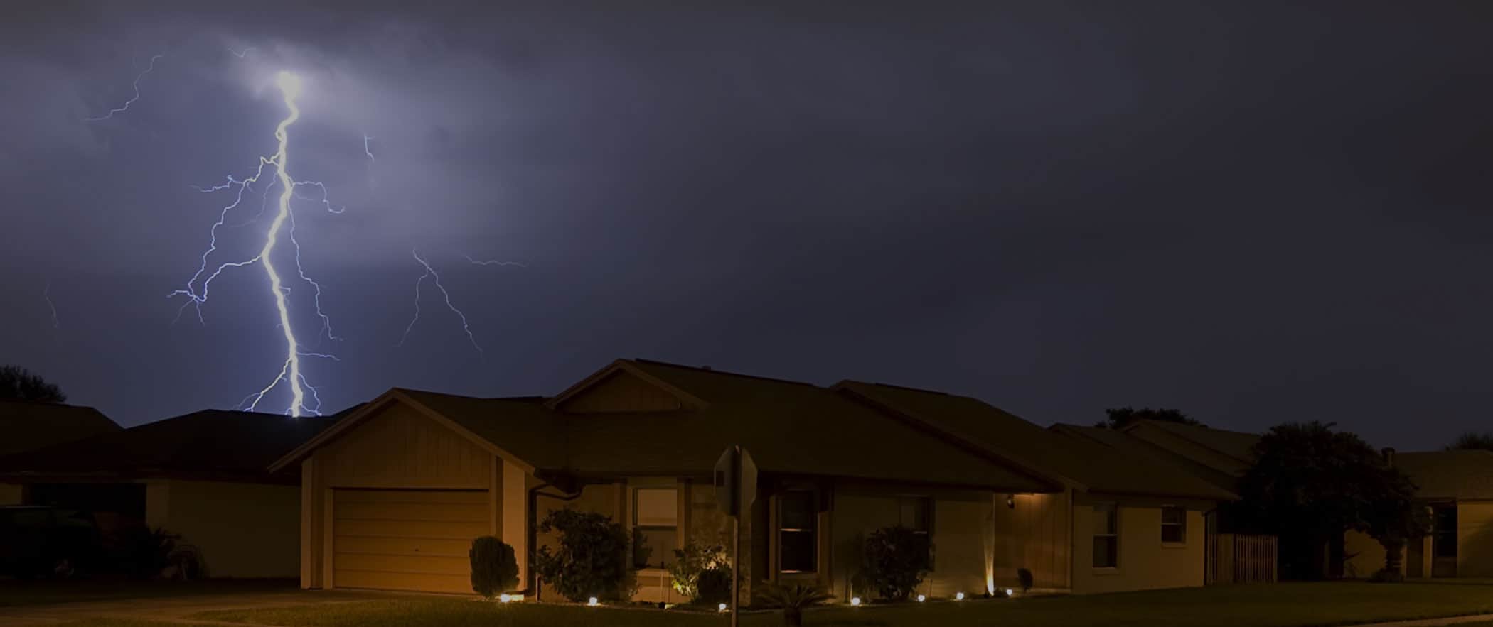 Lightning Strikes a Home During a Severe Storm