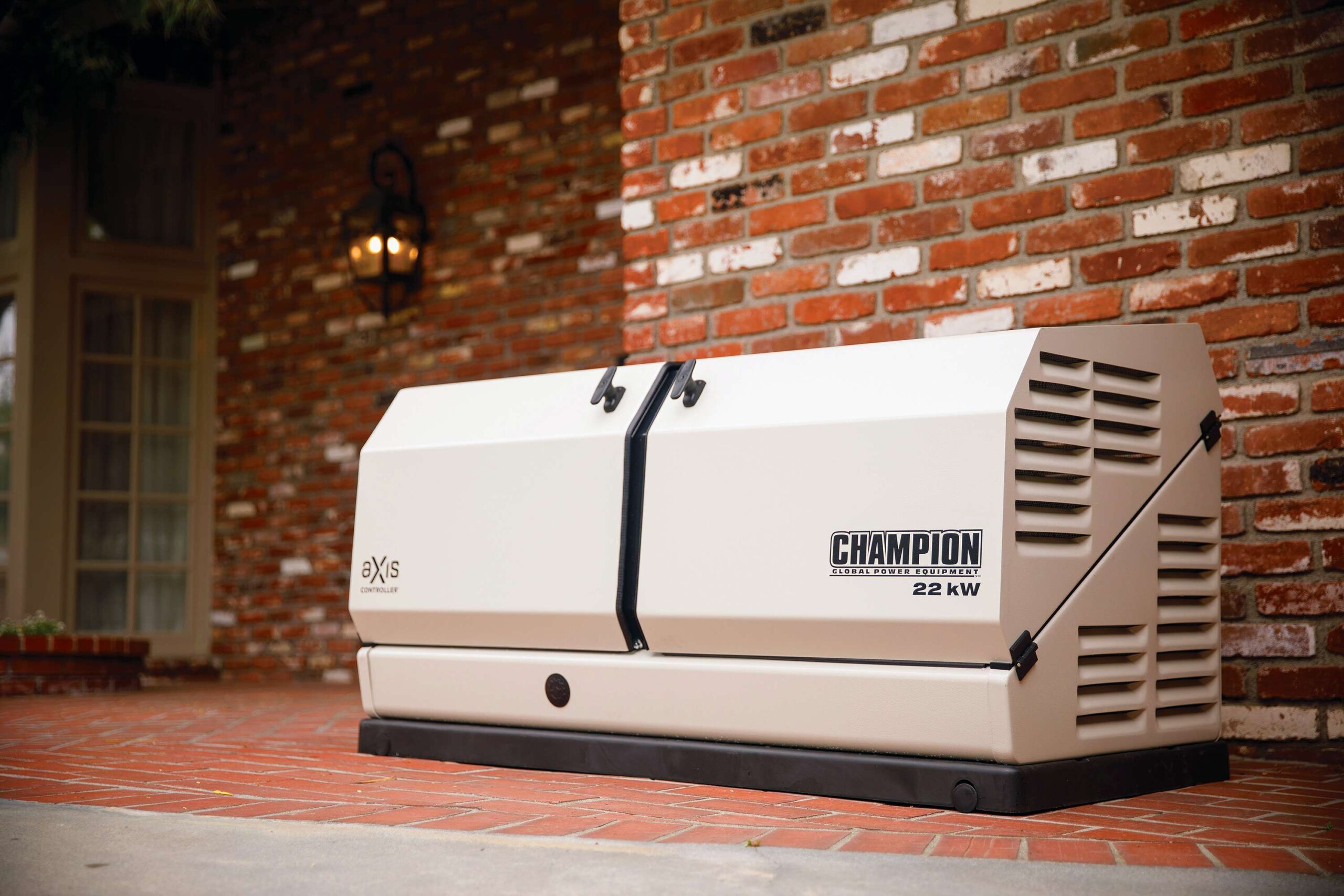 Champion 22kW Generator Near a Home's Brick Wall on a Brick Patio