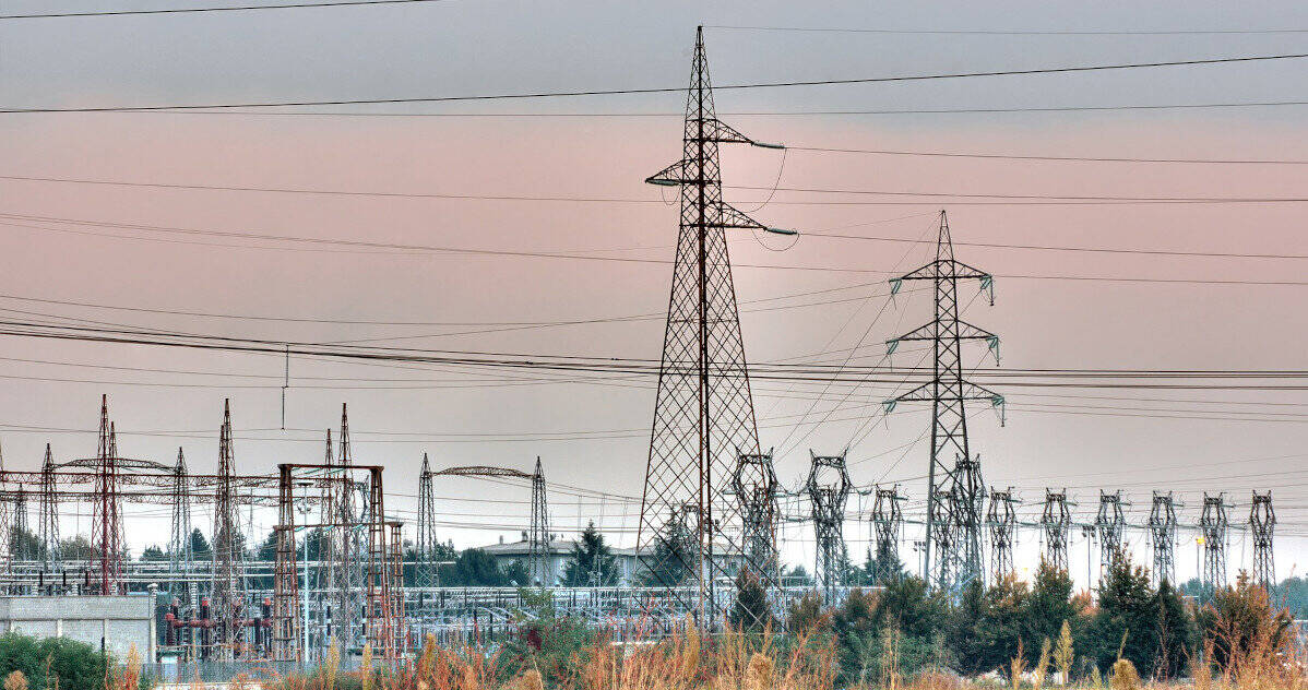 A Power Plant Substation with Transmission Towers, transformers, and switching equipment for local and long distance power transmission